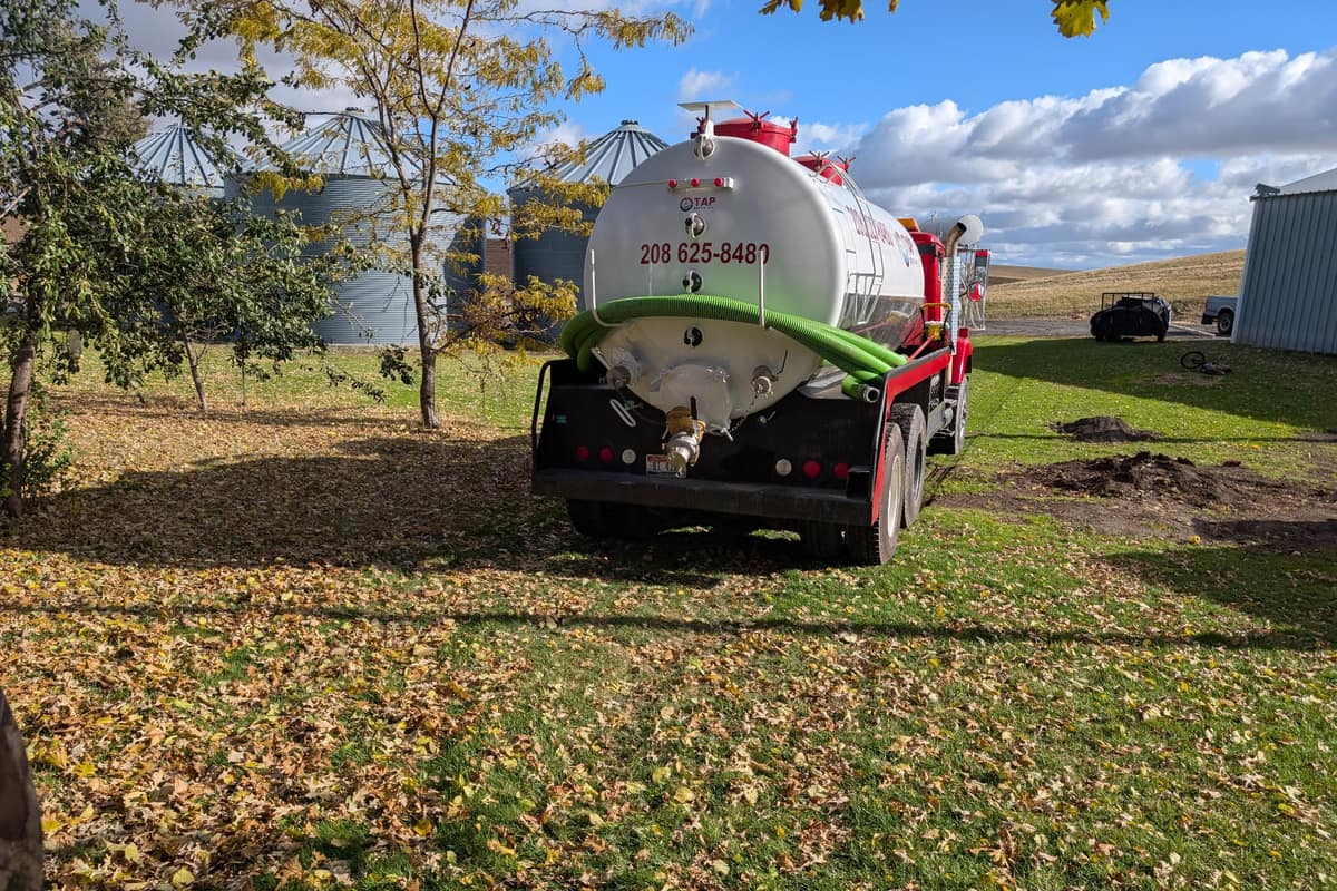 TAP Septic pump truck on a rural property near Athol, Idaho